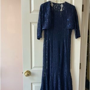 Formal evening gown with bolero lace jacket in navy blue with sequins worn once.